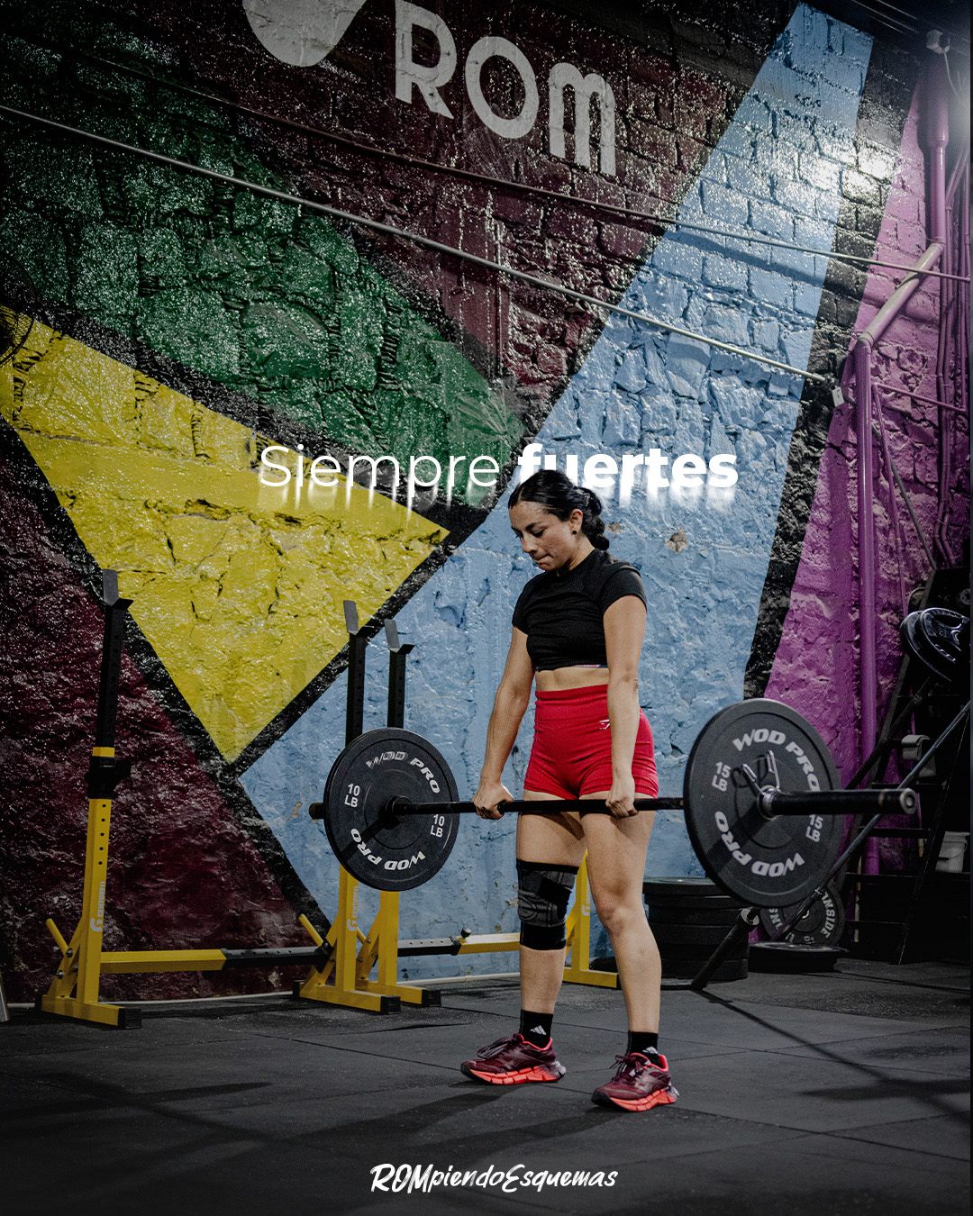 Contenido para ROM: levantamiento de barra frente al mural del gimnasio